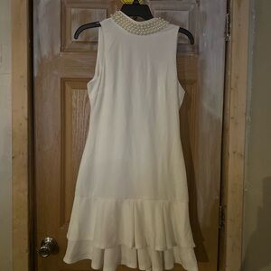 Elegant Ivory Sleeveless Dress with Pearl Detail